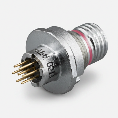 Metallic connector with three pins on a white background