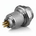 A small metallic cylindrical connector with a knurled textured body and several gold-toned pins visible on one end, shown on a plain white background.
