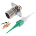 An RF connector tool kit featuring a silver metal RF connector, a green and white plastic probe, and several small gold and black radial resistors, displayed on a clean white background.
