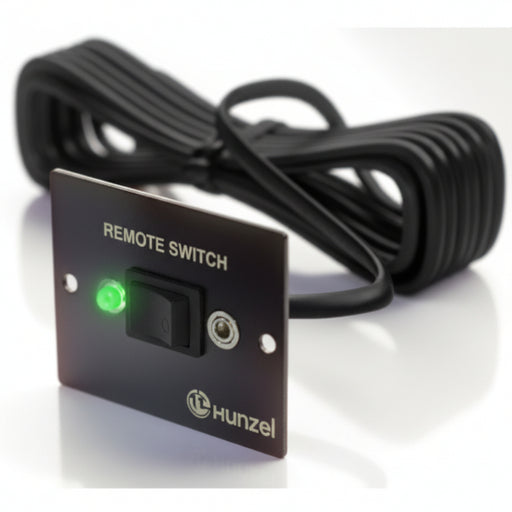 A black remote switch control module with a coiled black cable, featuring a power switch and a green indicator light, on a white background.