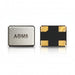 Two small electronic components on a white background: a silver rectangular chip with the text 'ADM8' and a black square component with four gold pads.