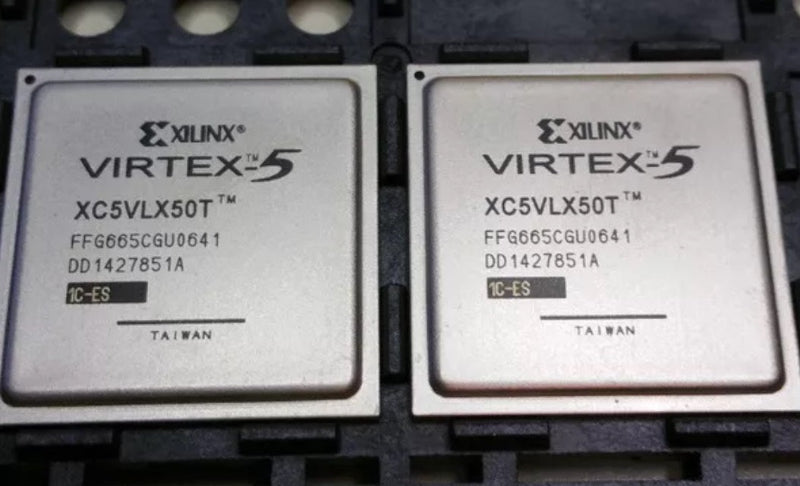 Two Exilinx Virtex-5 FPGAs on a black background