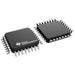 Two black Texas Instruments integrated circuit chips with silver metal pins, shown on a plain white background.
