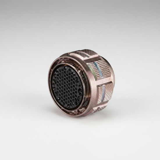 A close-up of a metallic cylindrical component with a dark perforated circular face and a textured side section, Conn Circular SKT 26 POS Crimp ST Cable Mount 26 Terminal 1 Port