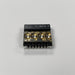 DL1416T Electronic component with gold and black design on a gray background