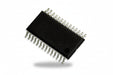 Black integrated circuit with silver pins on a white background