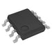 Black electronic component with silver legs on a white background
