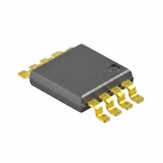 A small rectangular electronic component with a dark gray body and bright yellow-green pins, shown on a plain white background.
