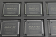 Close-up of electronic components with 'Altera' branding on a gray background
