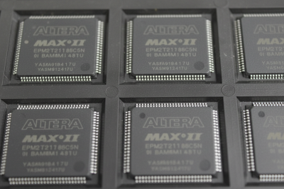 Close-up of electronic components with 'Altera' branding on a gray background