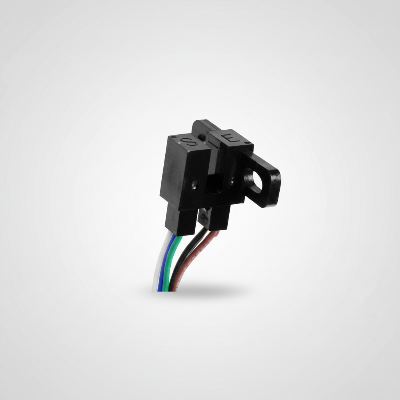Black electronic component with wires on a white background