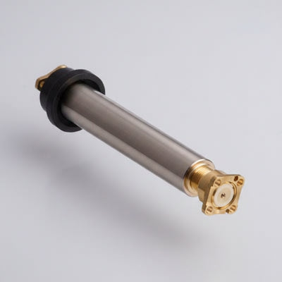 Metallic cylindrical object with a white core on a dark background