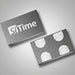 Two rectangular metallic USB flash drives, one showing the 'SiTime' logo and the other displaying four circular cutouts, on a plain white background.