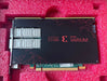 A Xilinx Varium C1100 PCIe card shown inside its pink foam packaging insert, featuring a black metal housing with red branding and multiple silver connector pins.